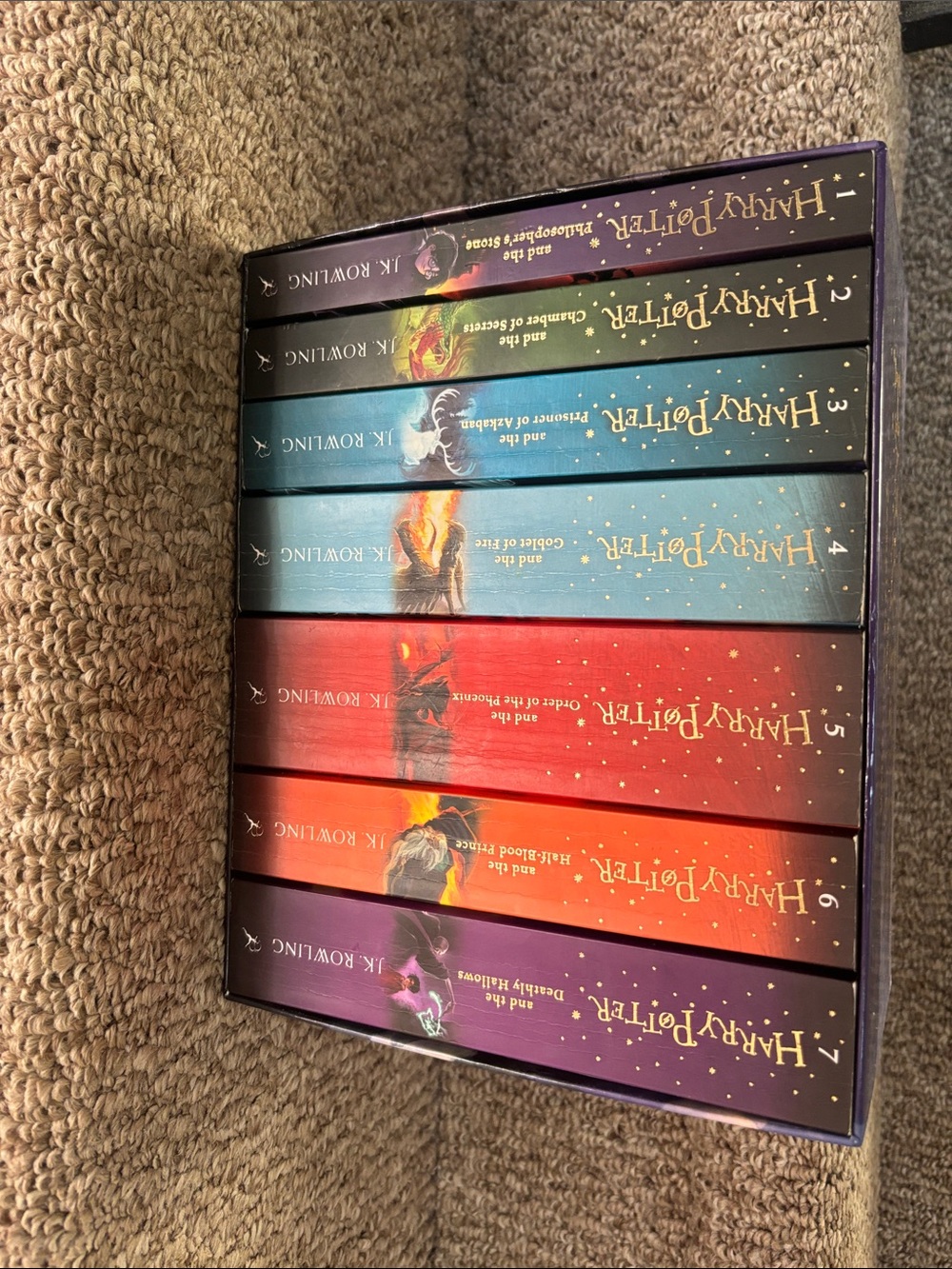 JK Rowlings. Harry Potter Complete Paper Collection Box Purple and Gold Artwork